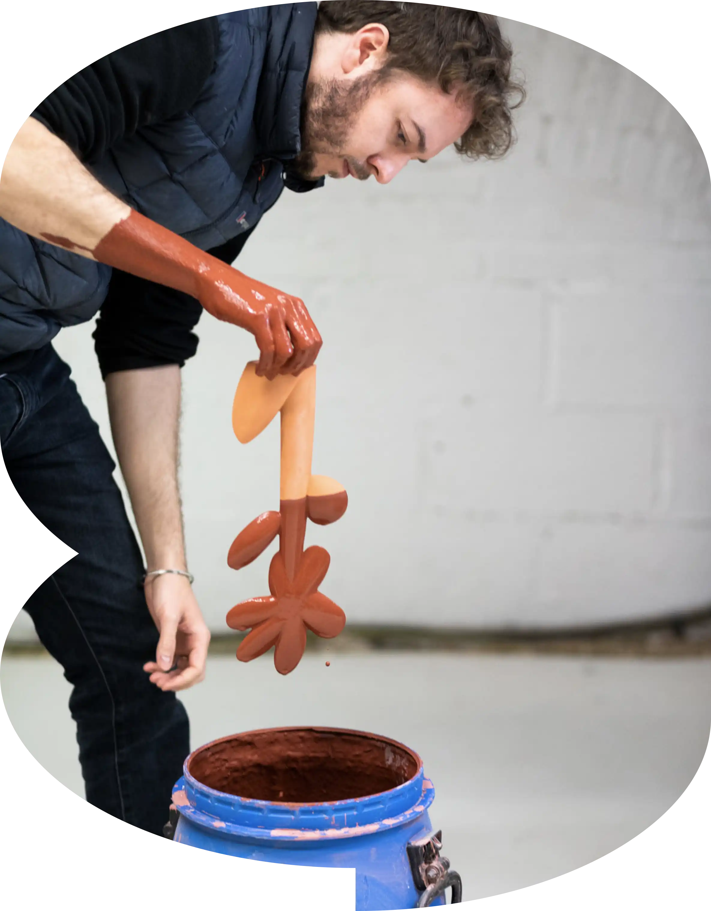 Designer working with clay in the studio