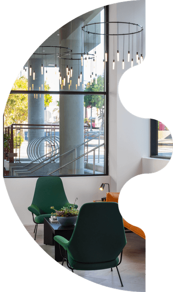 Huanbazar Pro — modern interior with green chairs and designer fixtures